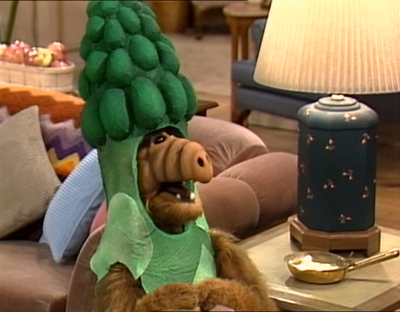 ALF in an asparagus costume.